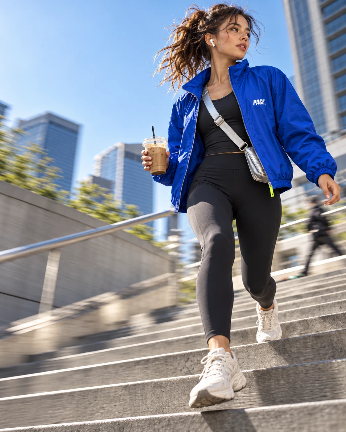 Woman moving through the city in PACE activewear
