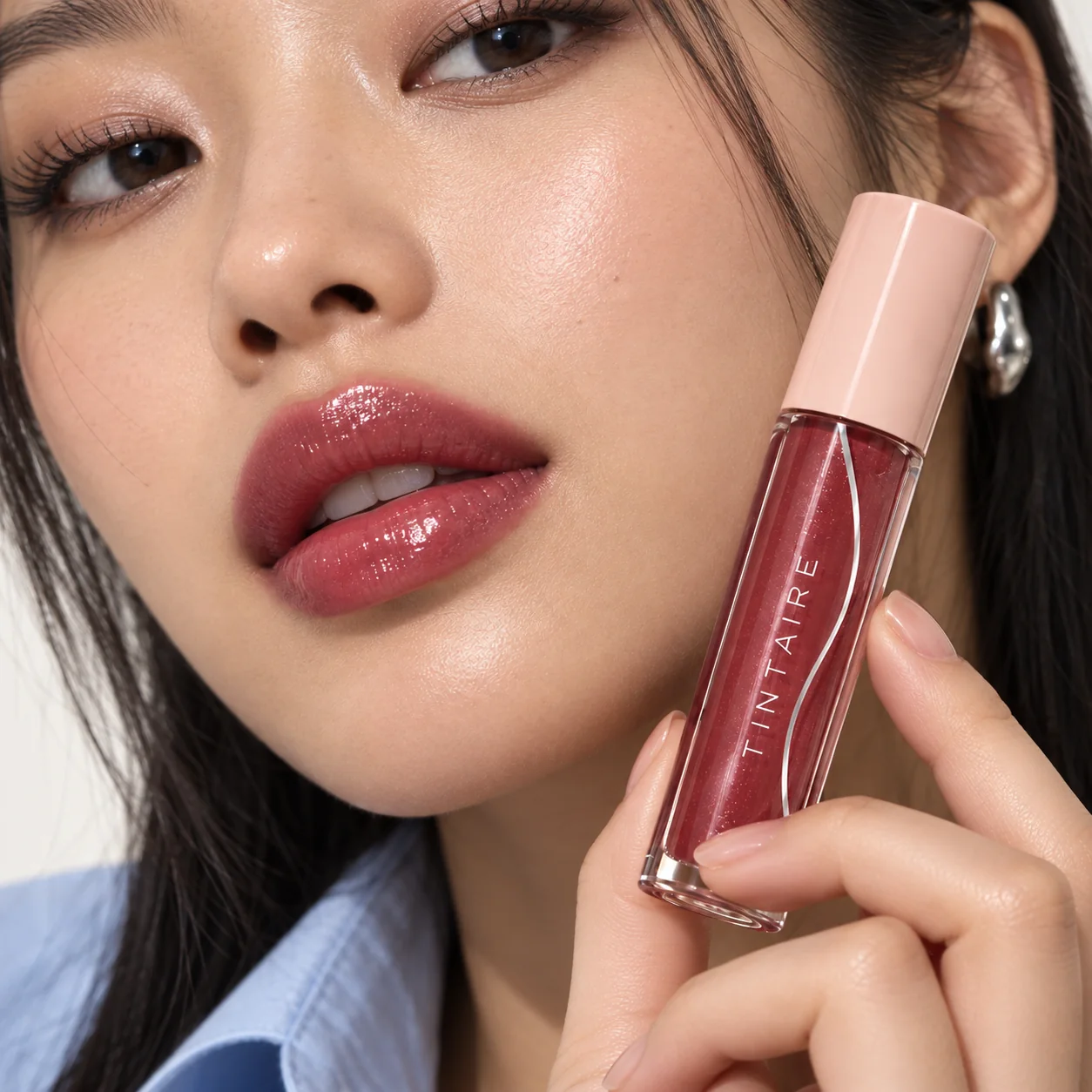 TINTAIRE lip colour worn in an everyday beauty close-up
